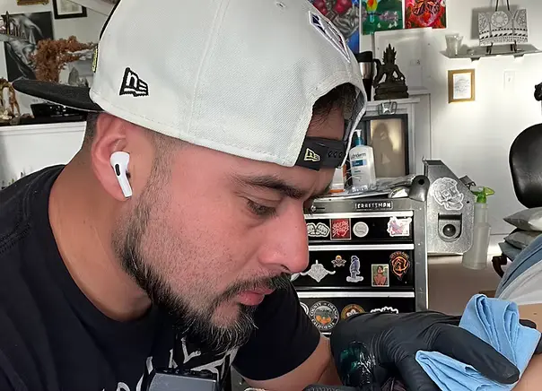Infamous Erick at Only 4Ever Tattoo Studio