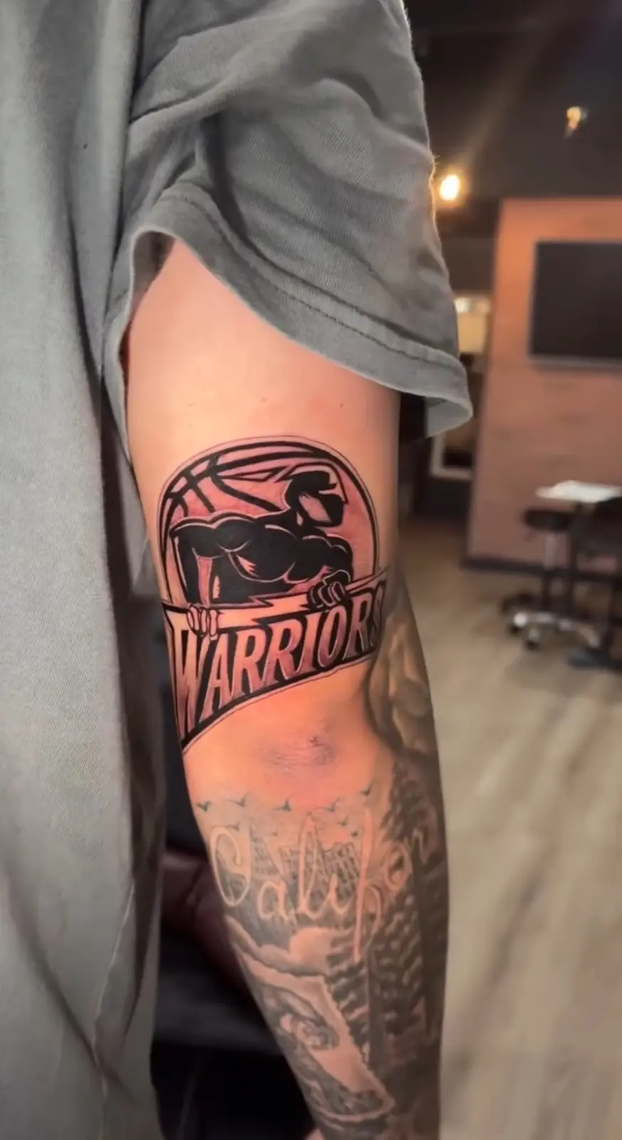 Warriors lettering tattoo
